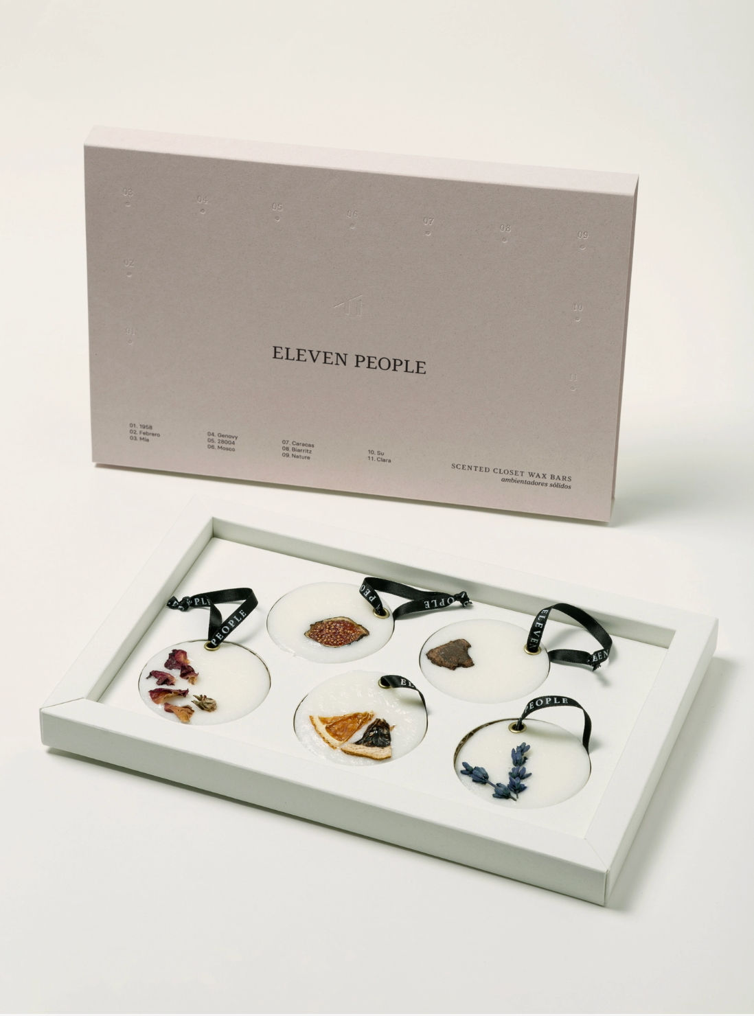 Set of decorative items in a box with 'Eleven People' branding on a white background