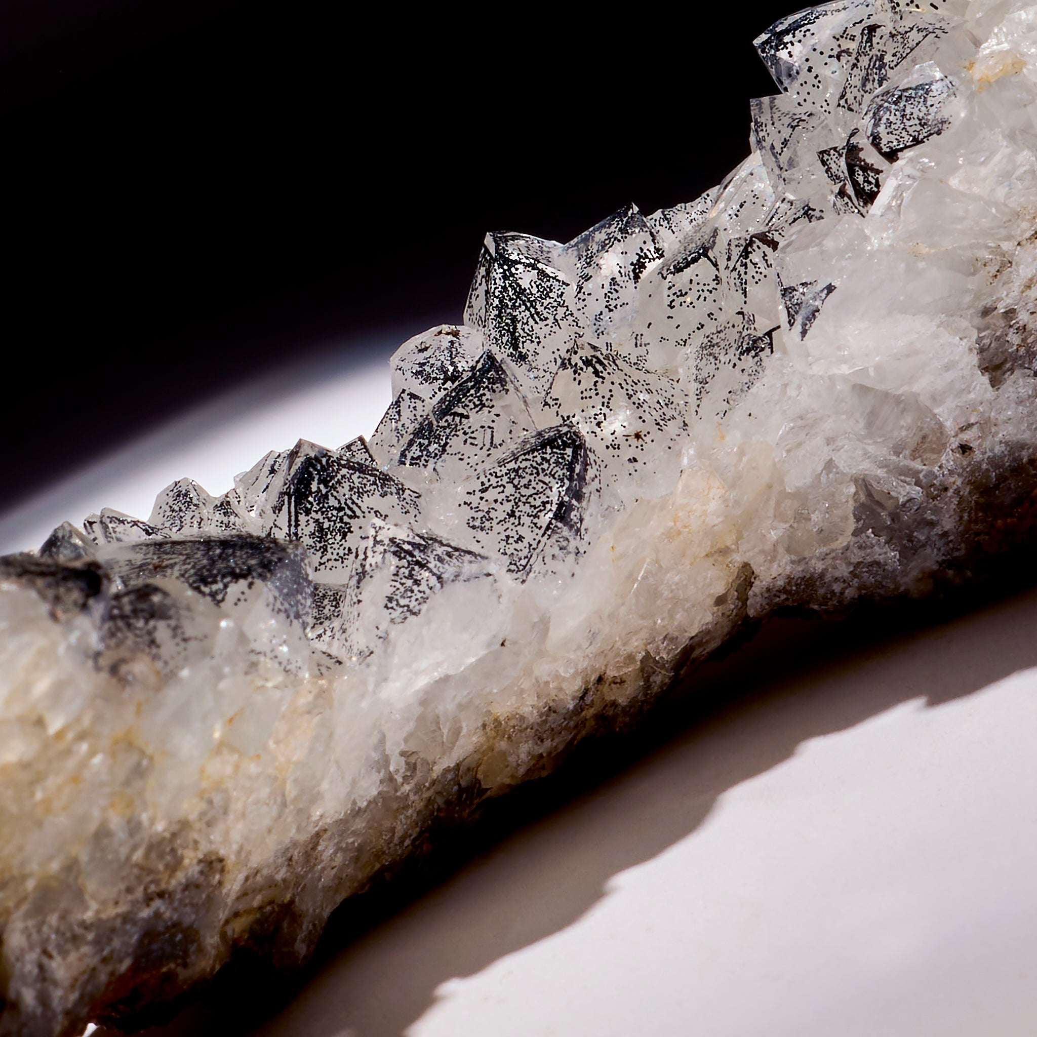 Close-up of a crystal formation on a dark background