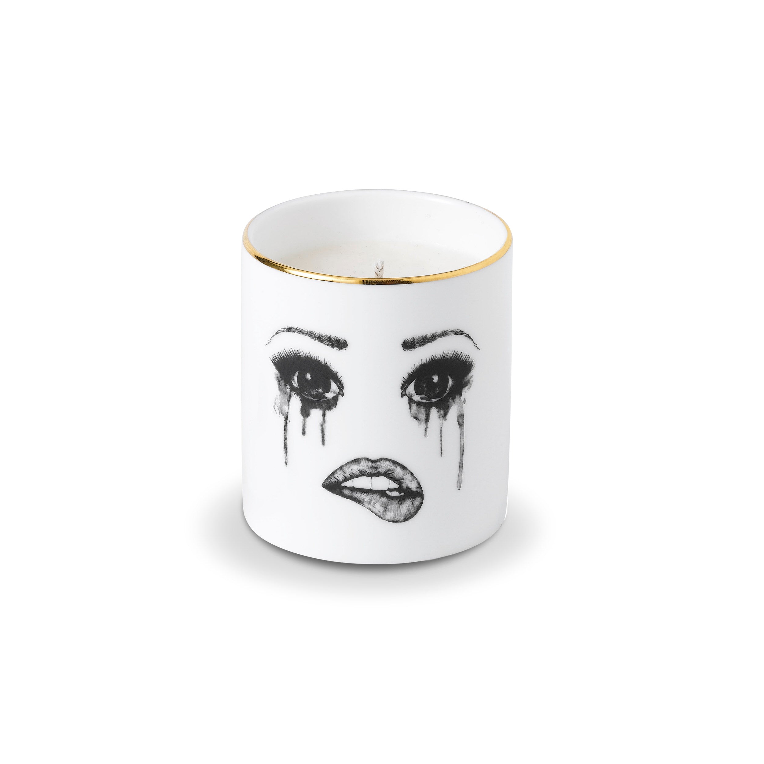 Candle with a face design on a white background