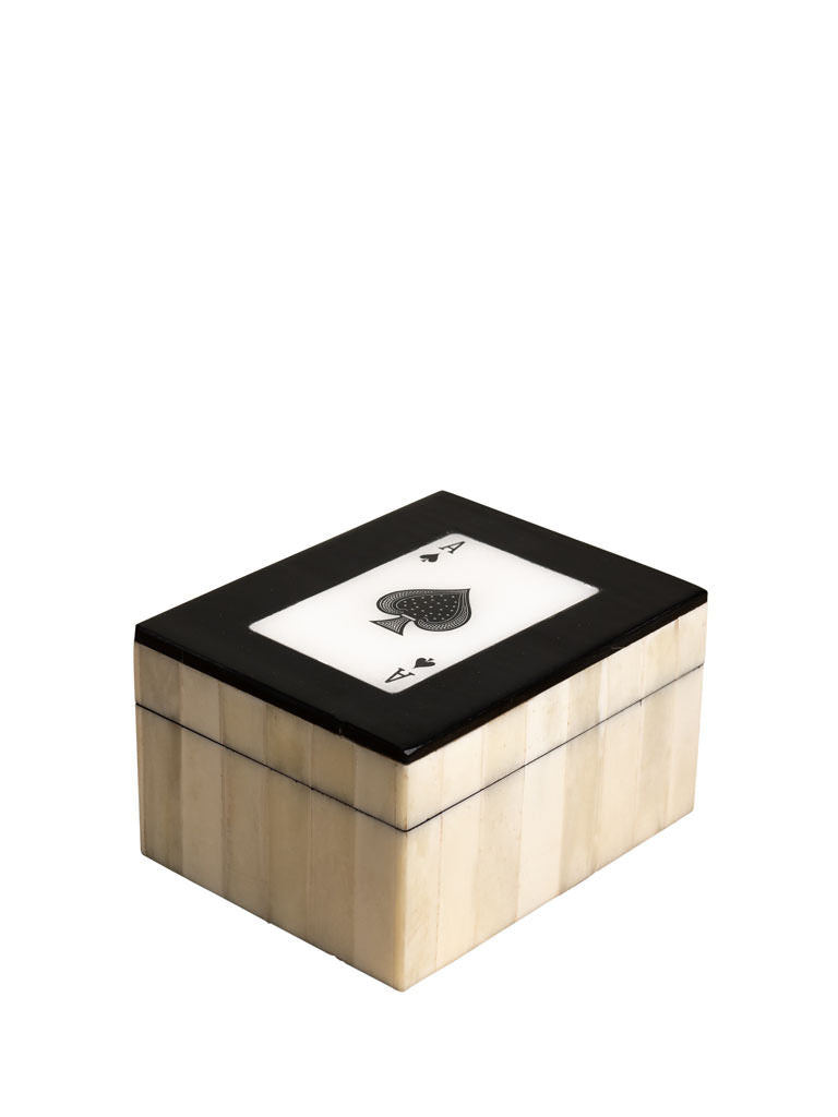 Wooden box with a playing card design on a white background