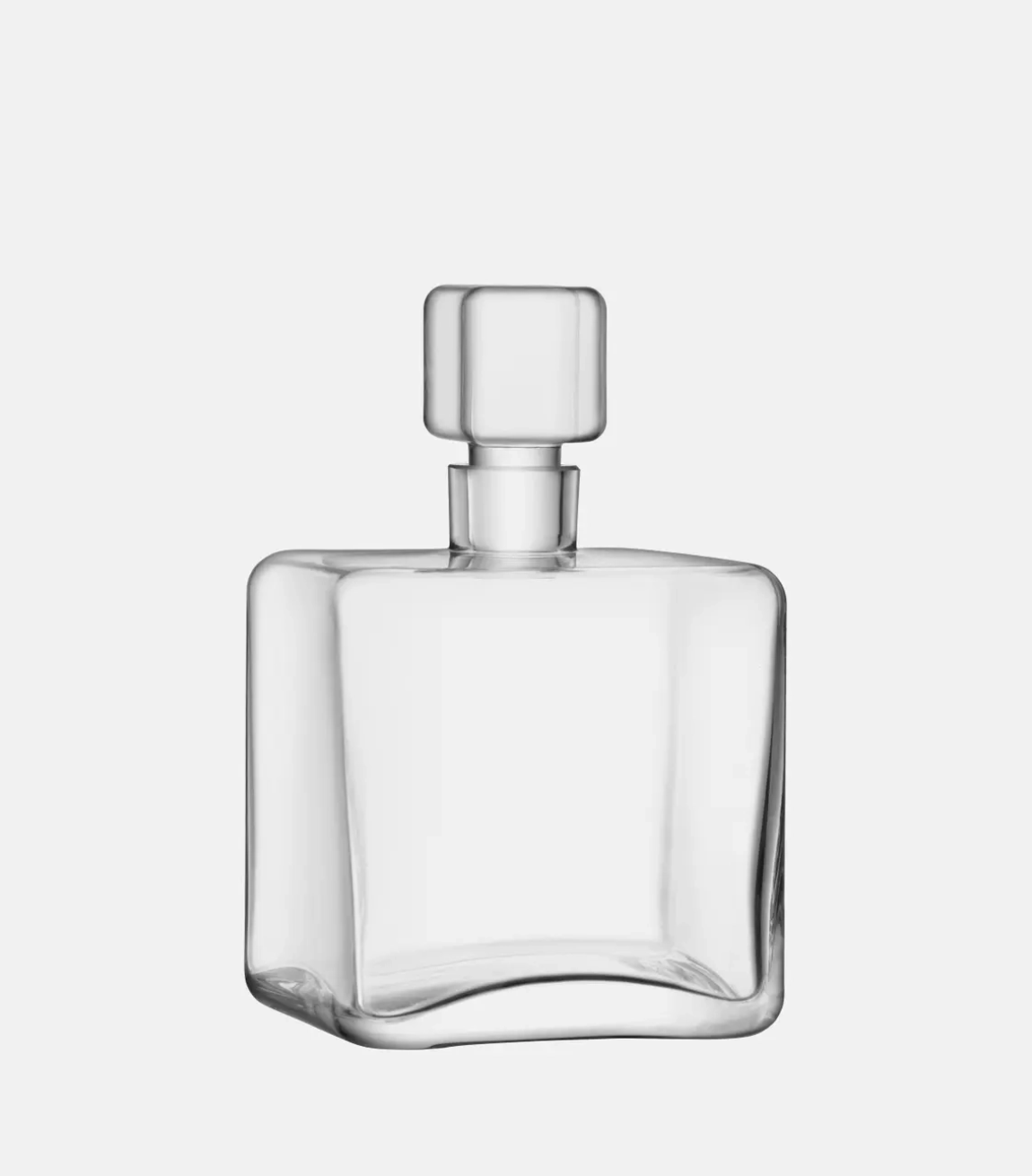 Clear glass bottle with a square shape on a white background