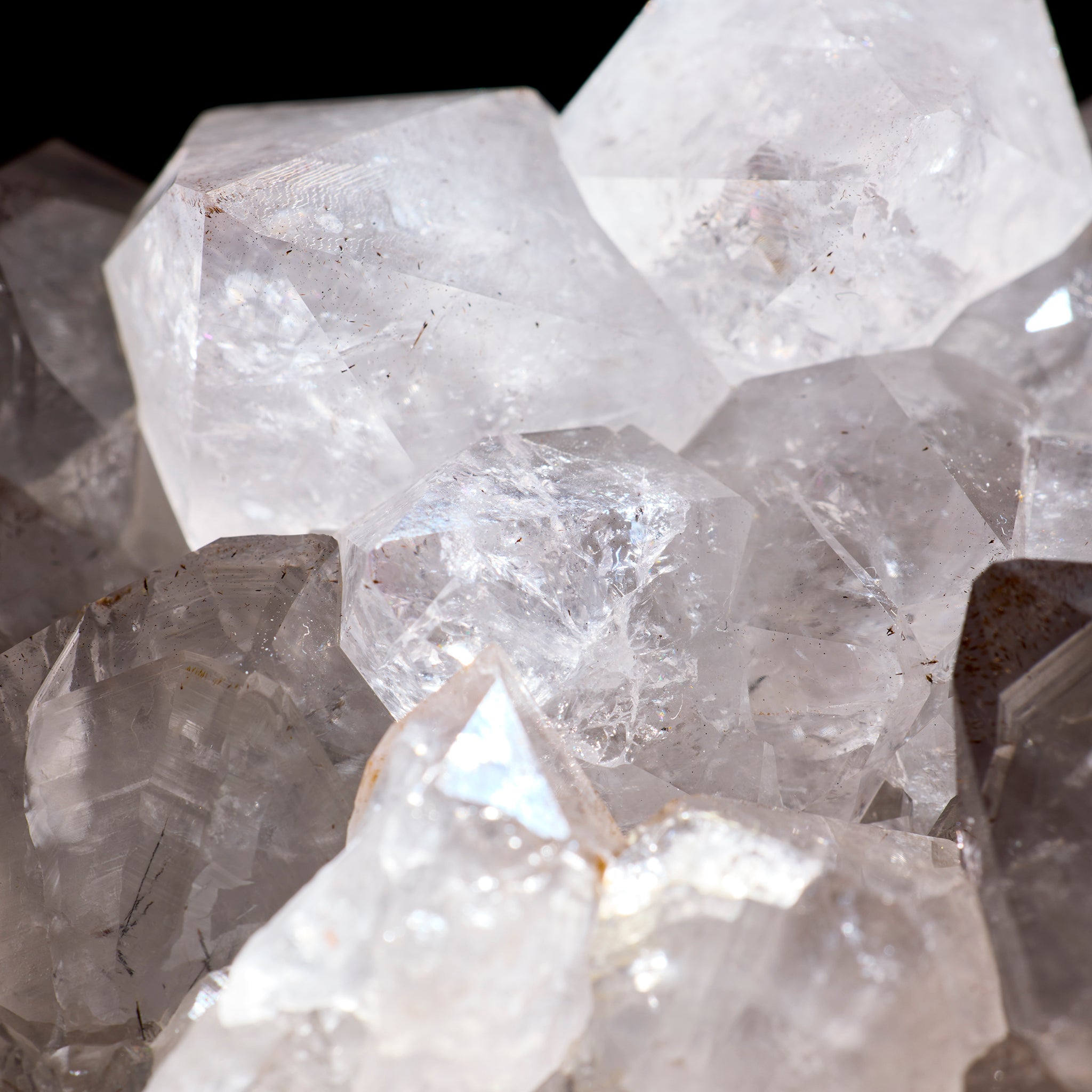 Close-up of crystal formations with a dark background