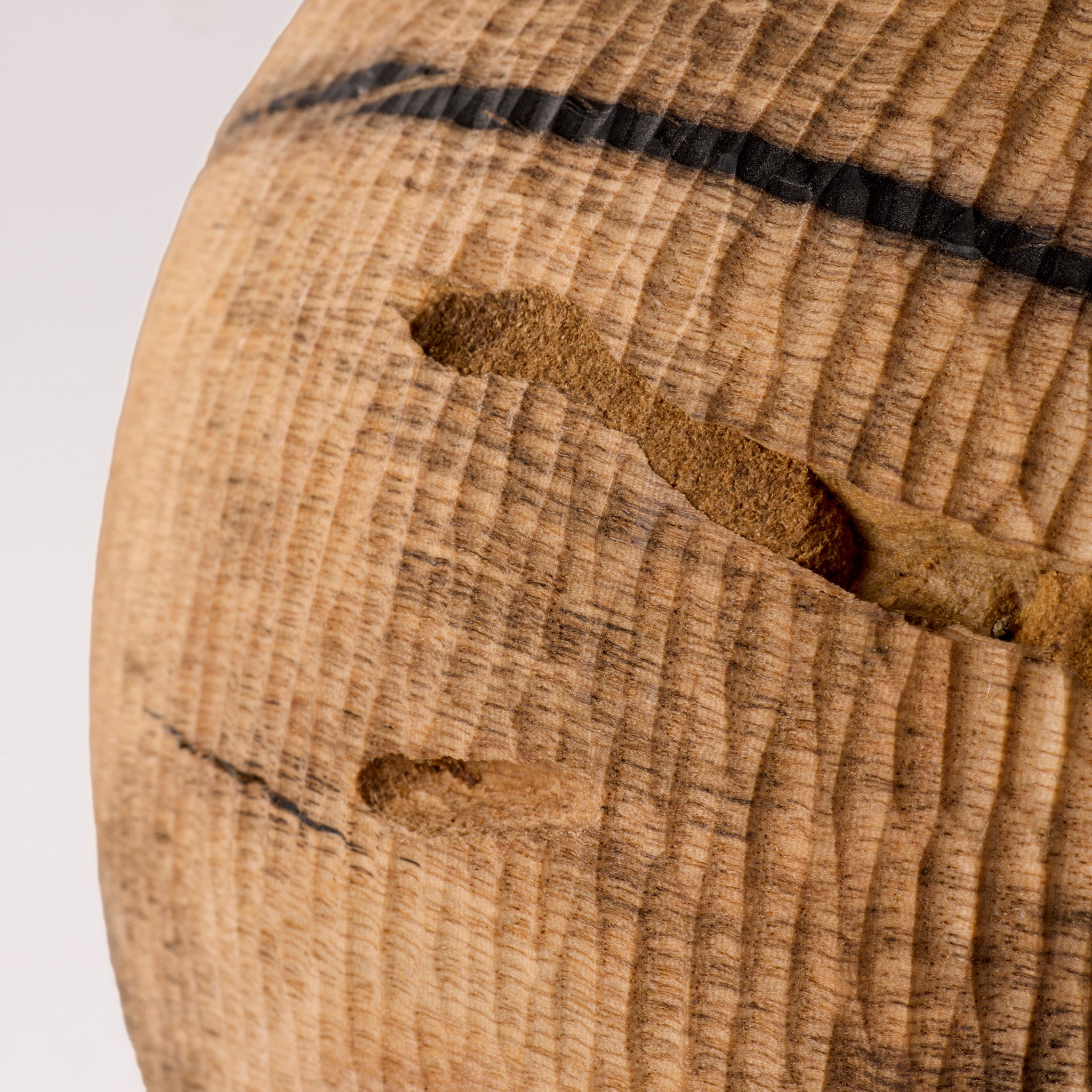 Close-up of a wooden surface with natural grain and texture.