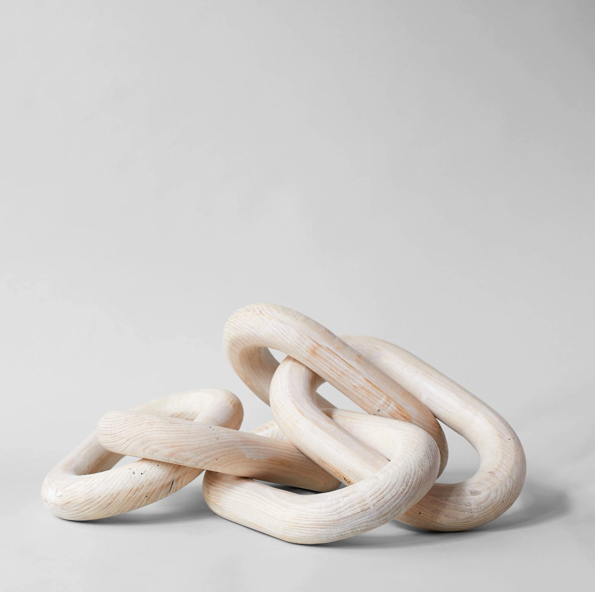 wooden chain links on white background