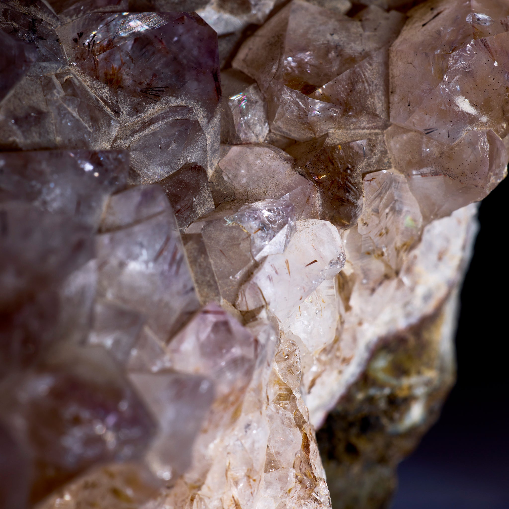 Close-up of crystal formations with a dark background
