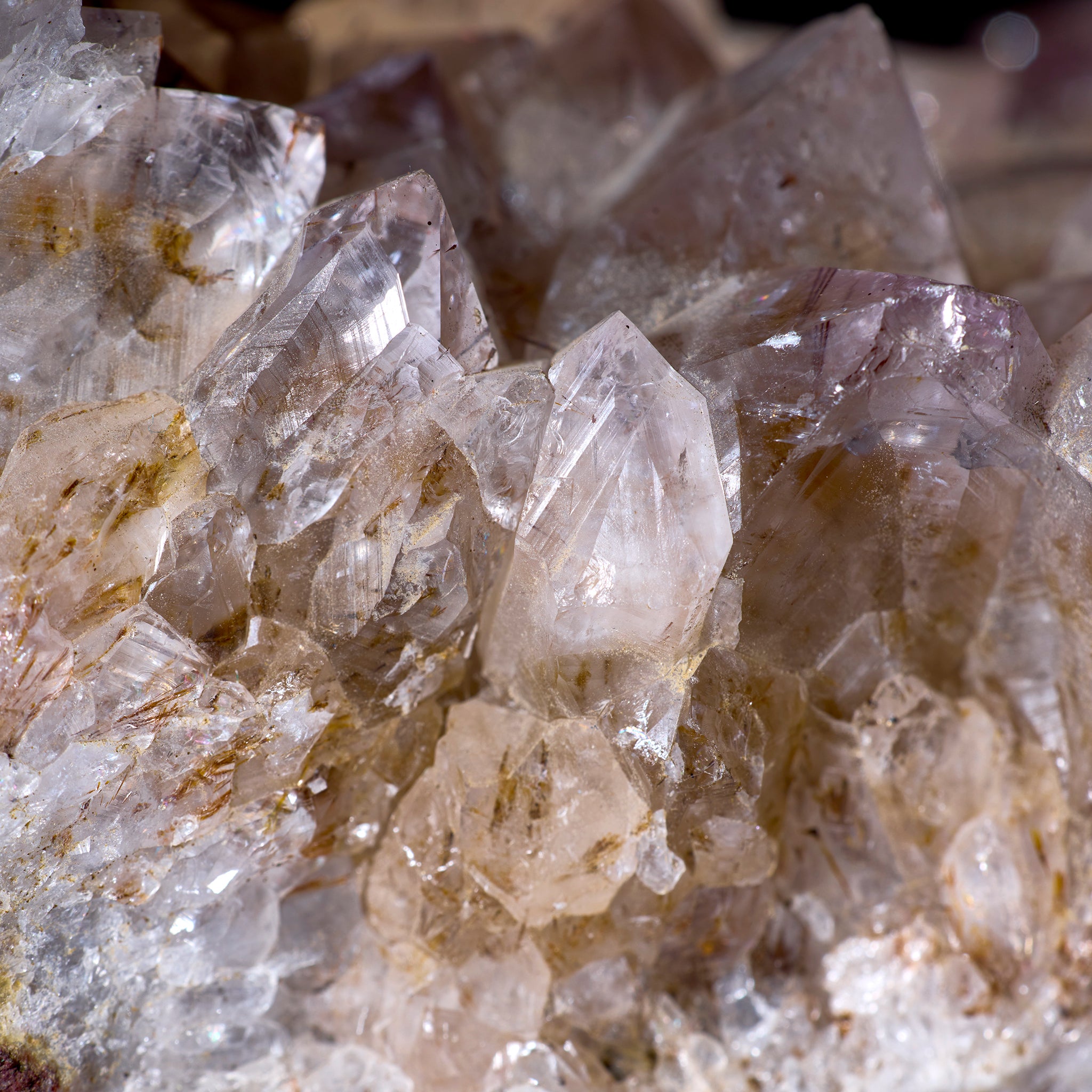 Close-up of crystal formations with a beige and brown color.