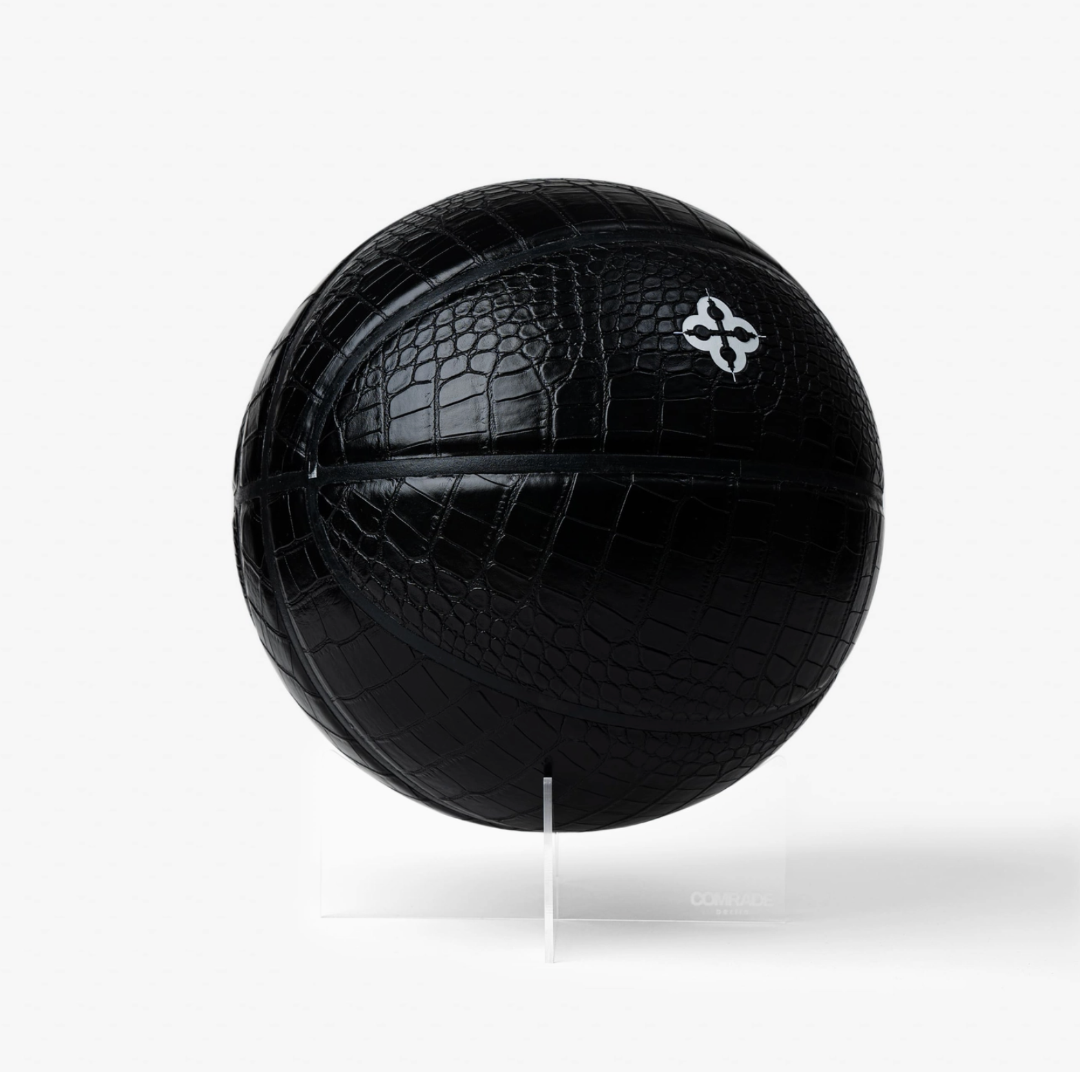 Black textured basketball on a white background
