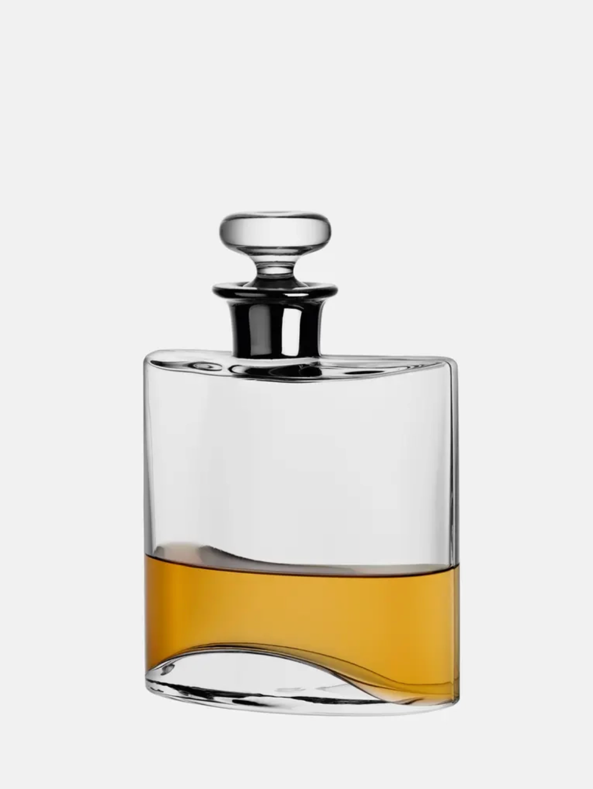 Glass decanter with a silver cap on a white background