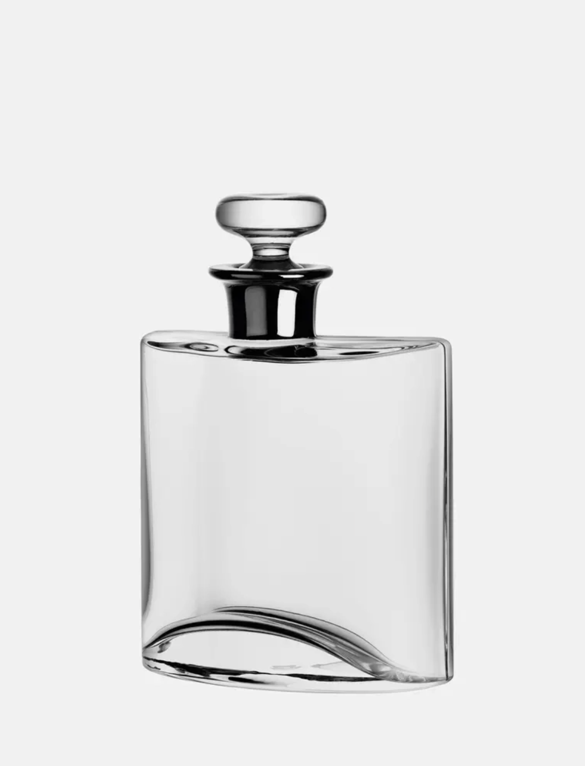 Clear glass flask with silver cap on a white background