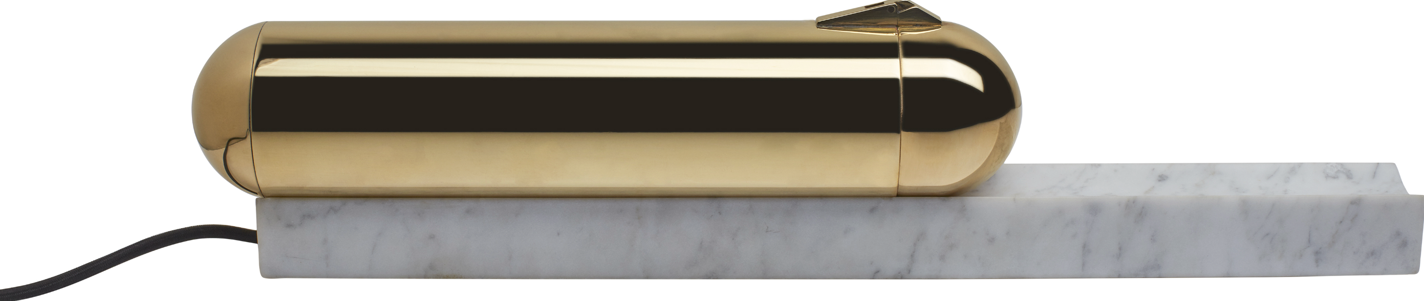 Gold cylindrical object on a marble surface