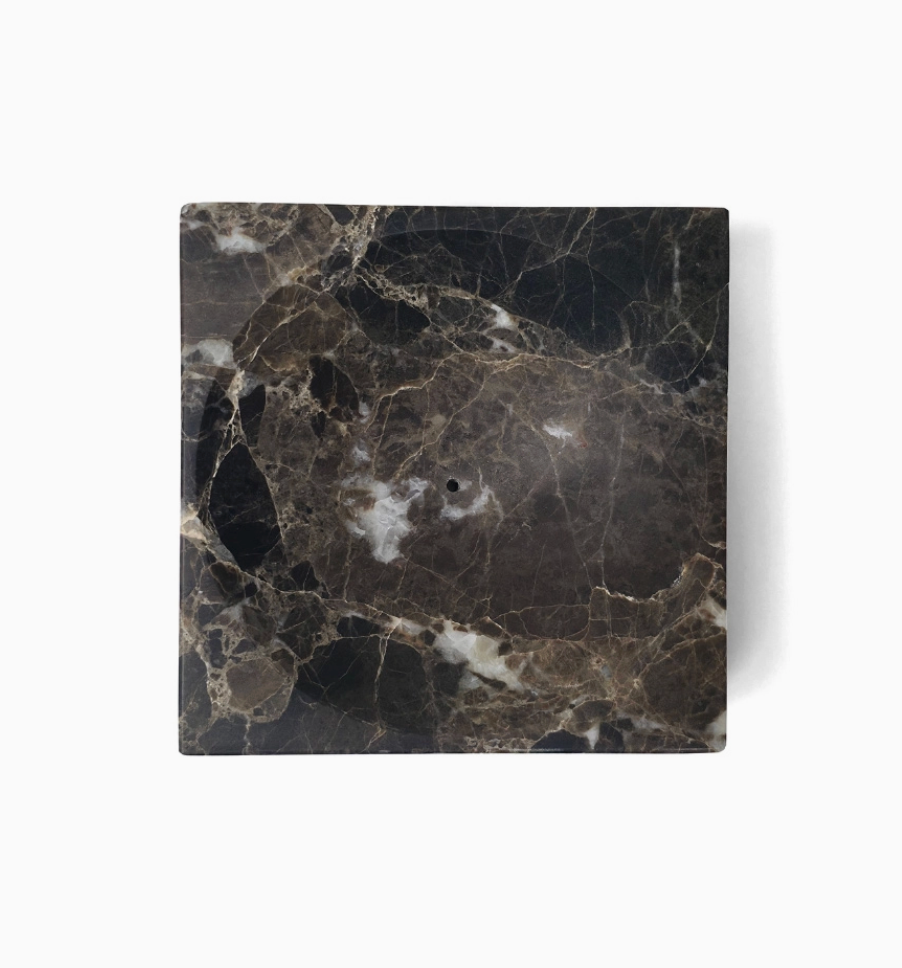 Square marble coaster with black and gray marbled pattern on a white background