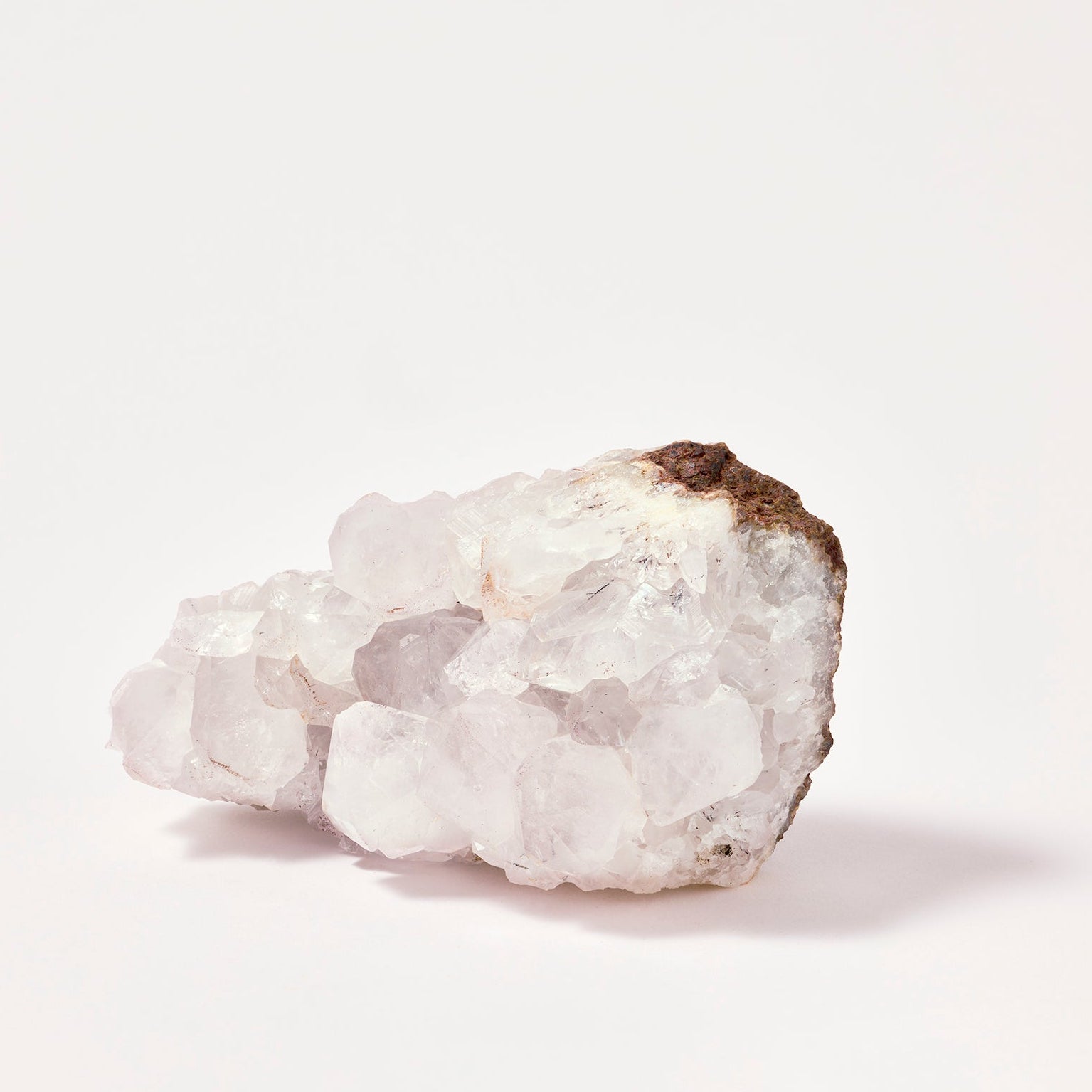 Raw crystal rock on a white background