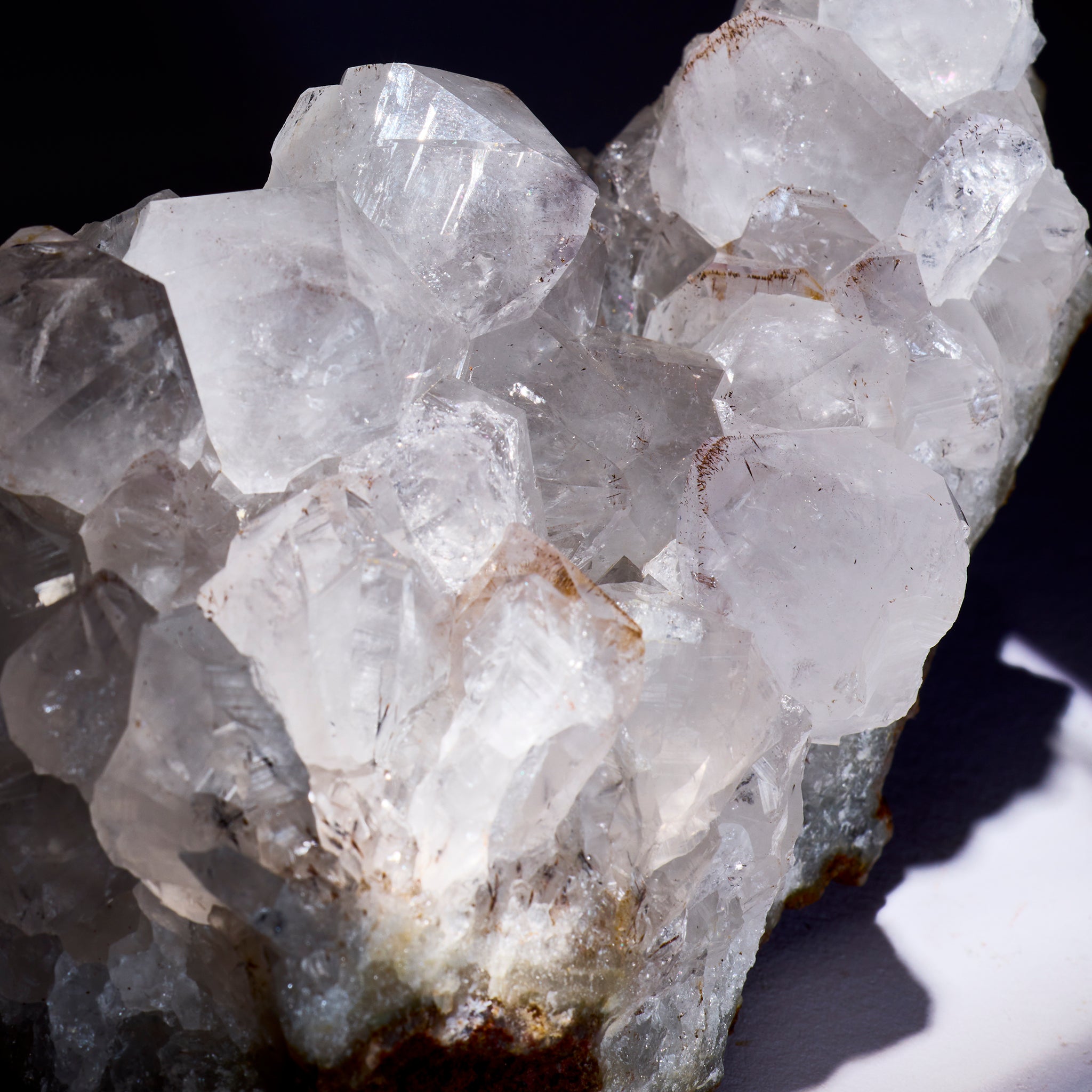 Close-up of crystal formation on a dark background