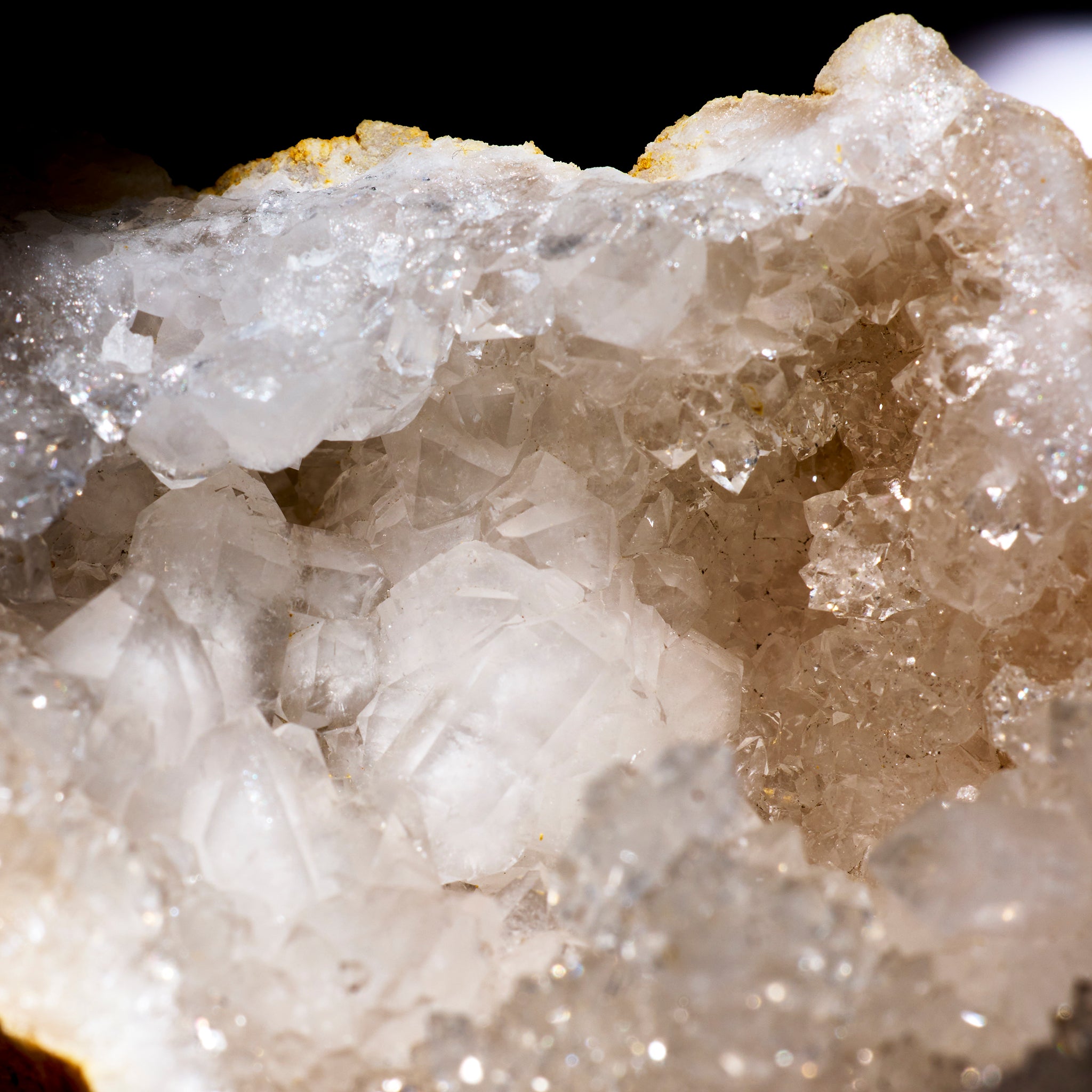 Close-up of a crystal formation with a dark background