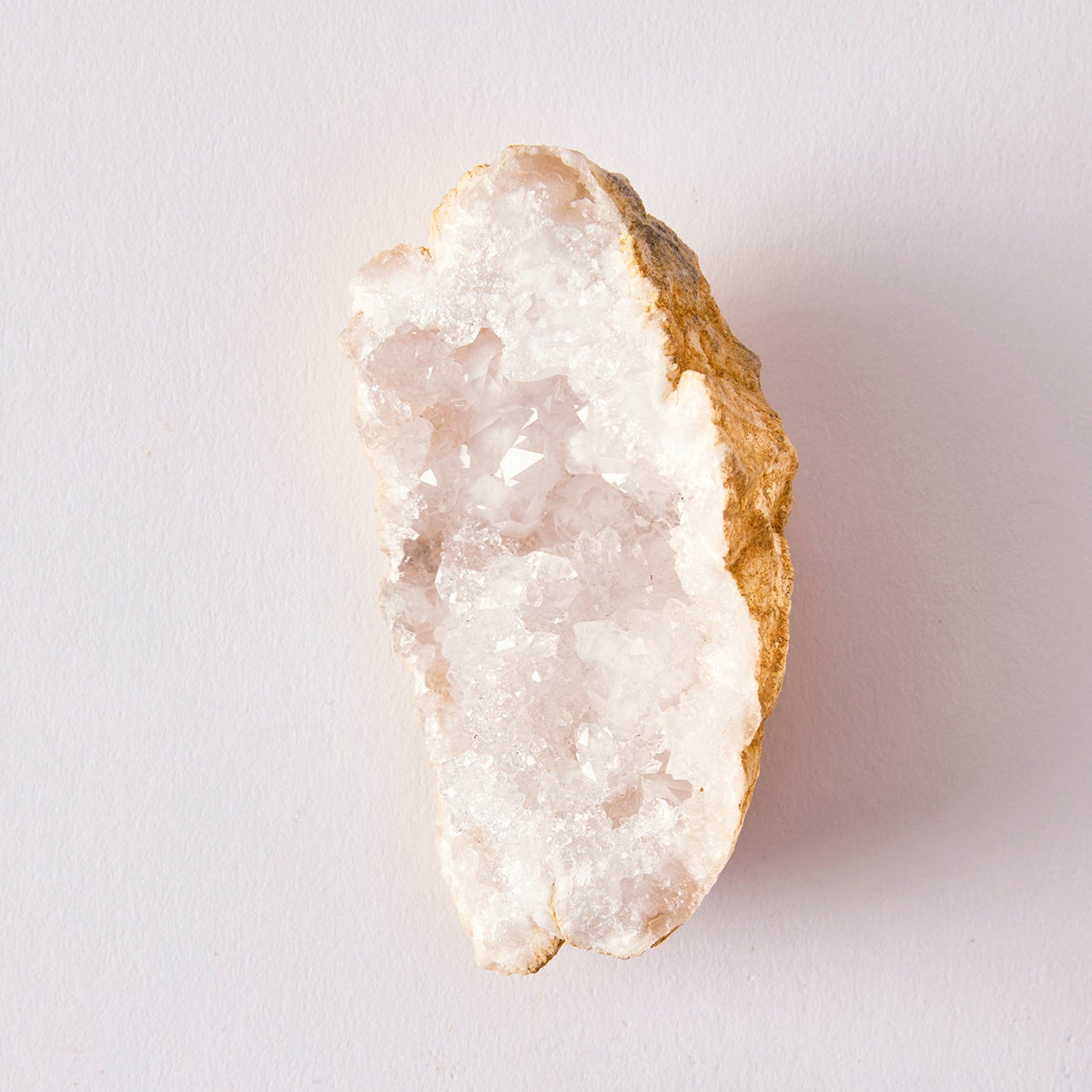 Crystal rock on a light gray background