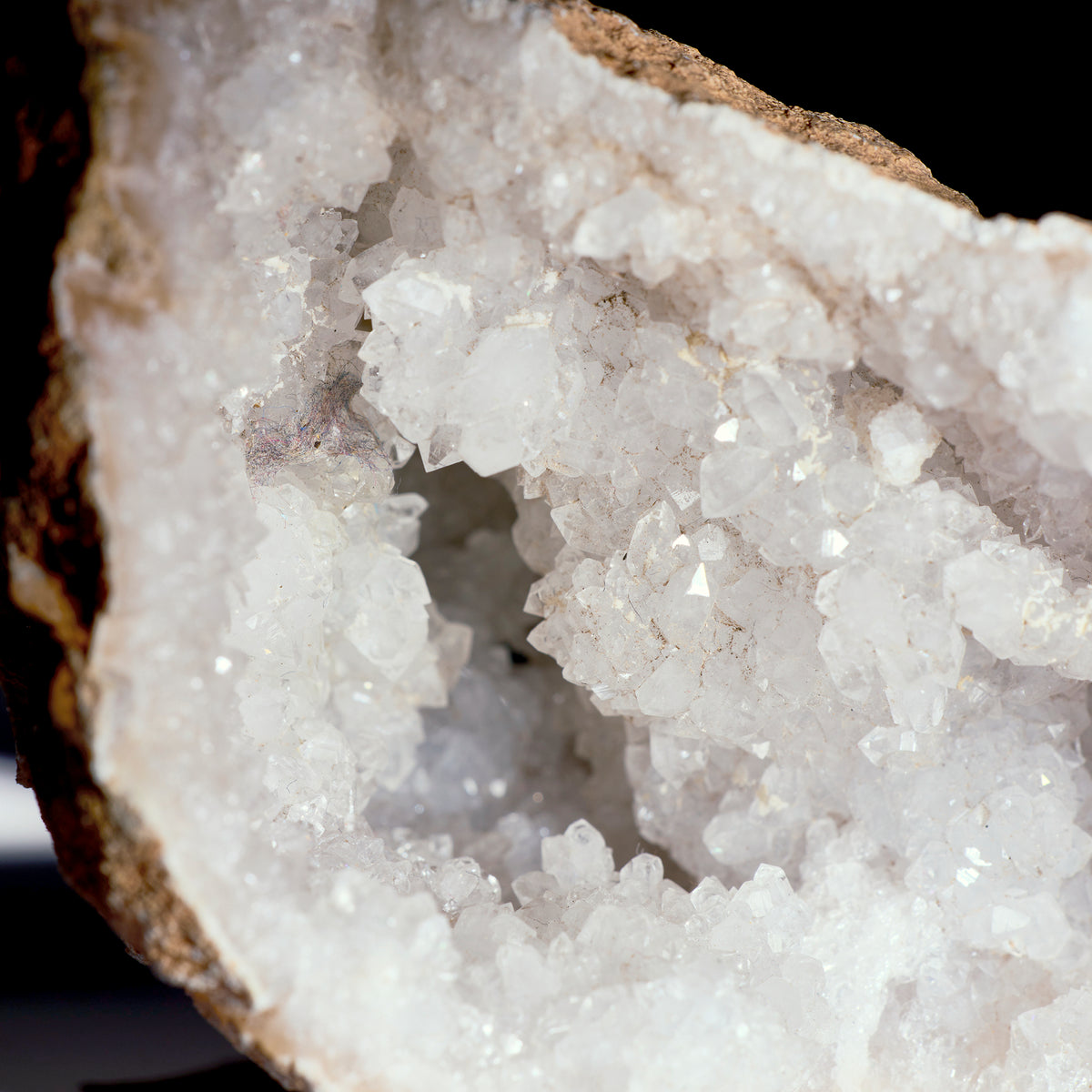 Close-up of a crystal formation with a dark background