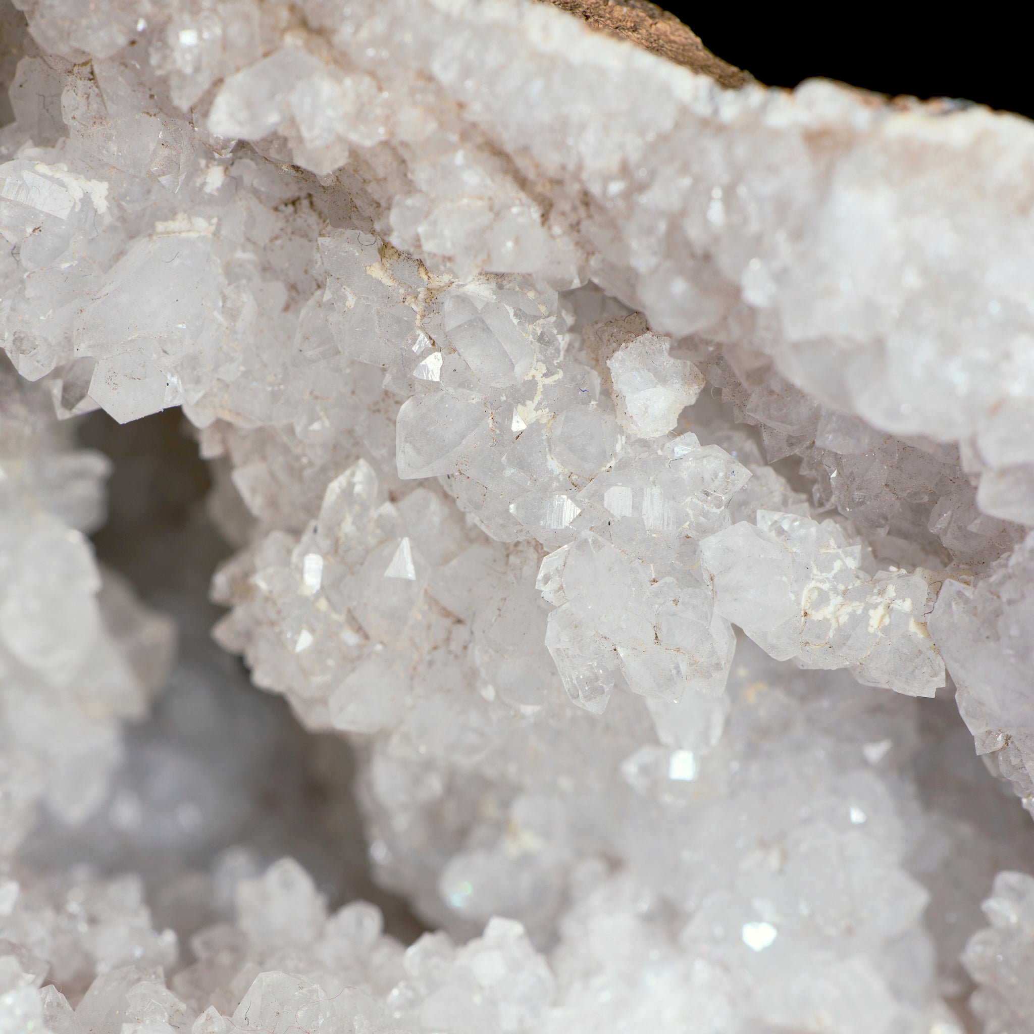 Close-up of a crystal formation with a dark background